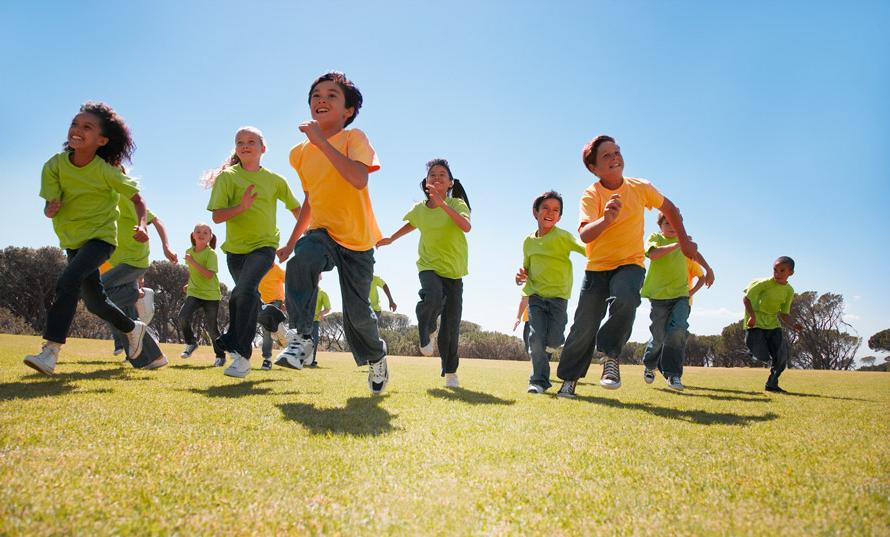 group of kids running at school recess